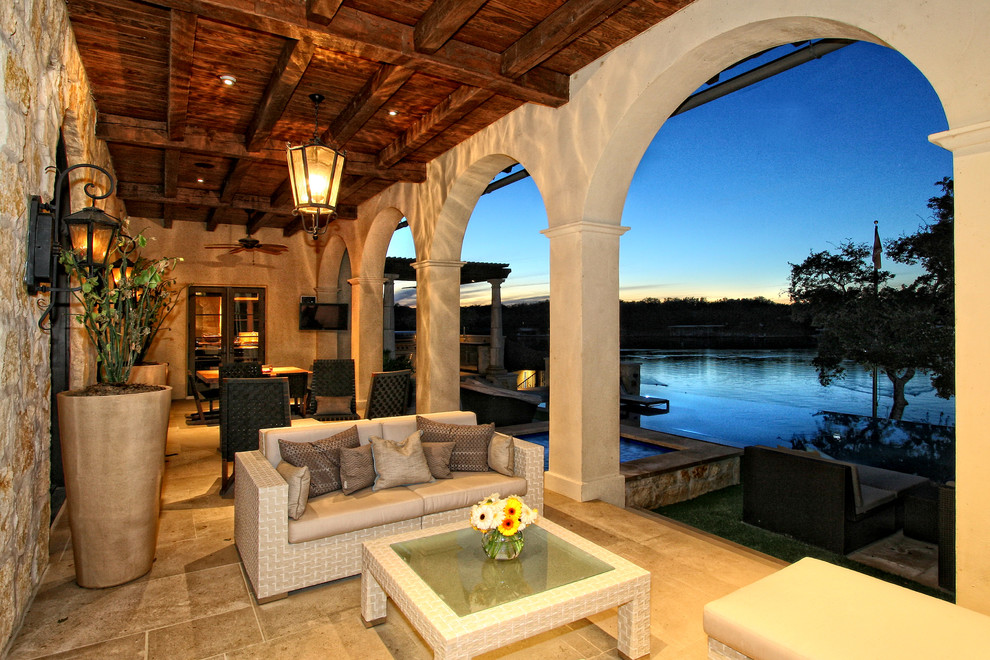 Example of a tuscan patio design in Austin