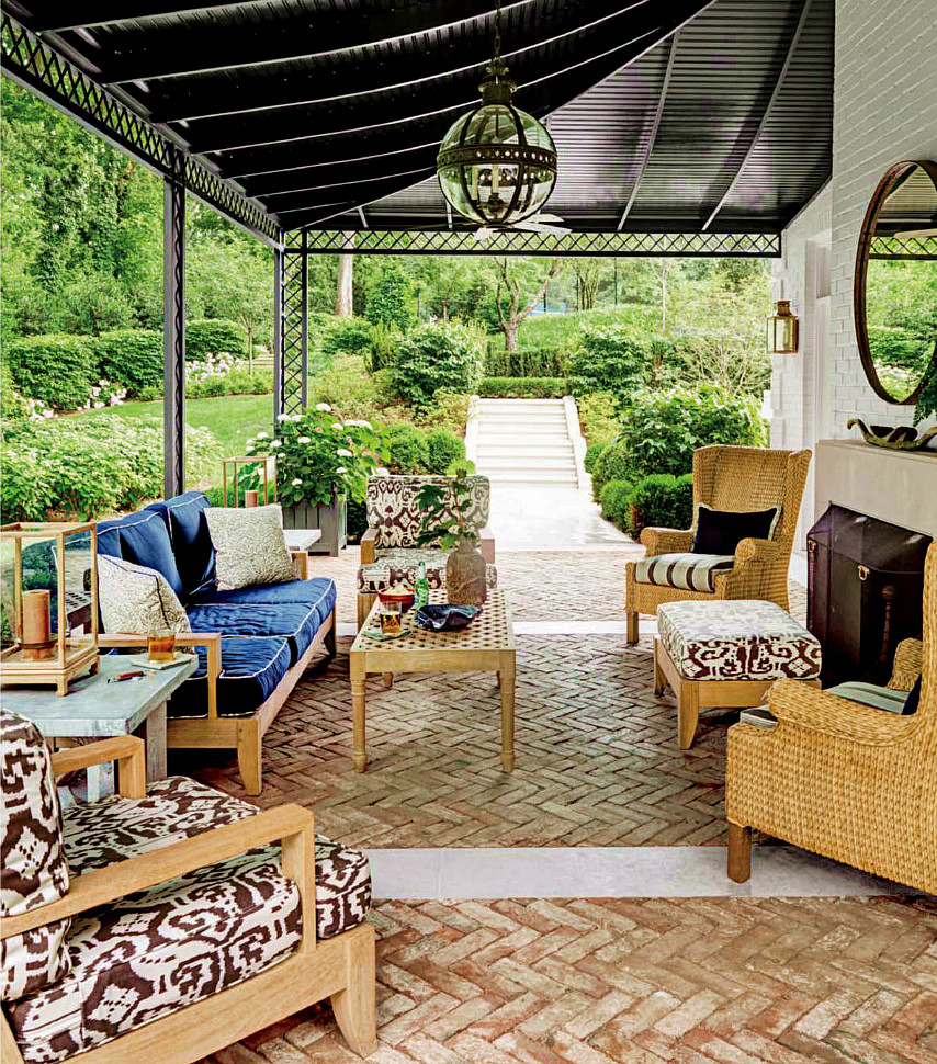 Inspiration for a medium sized traditional side patio in Nashville with a fire feature, brick paving and a pergola.