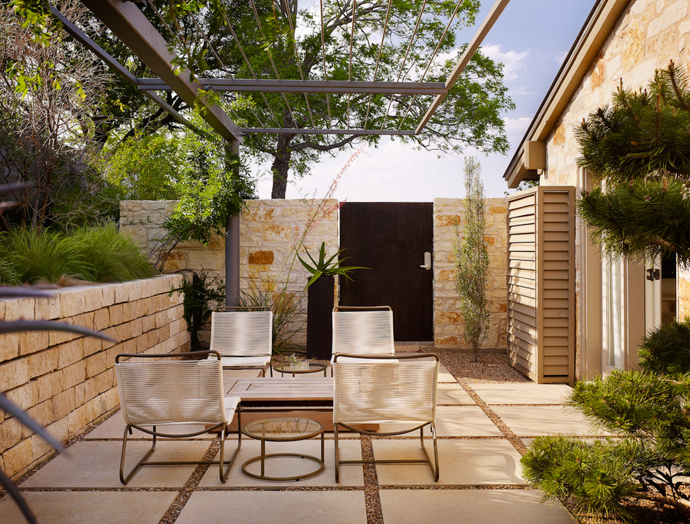 Patio - contemporary patio idea in Austin with a pergola