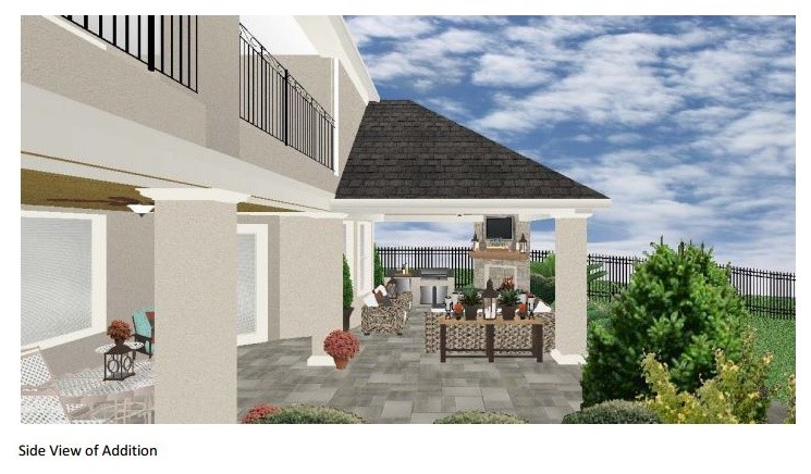 Modelo de patio clásico renovado de tamaño medio en patio trasero y anexo de casas con cocina exterior y suelo de baldosas