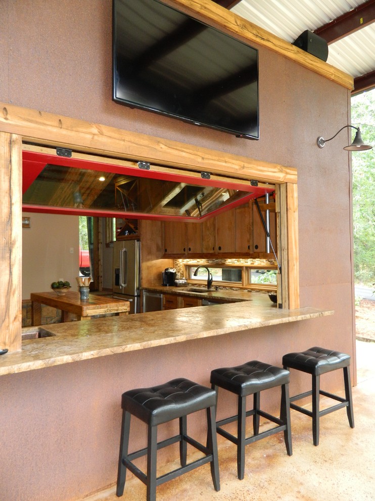 Patio kitchen - rustic patio kitchen idea in Dallas