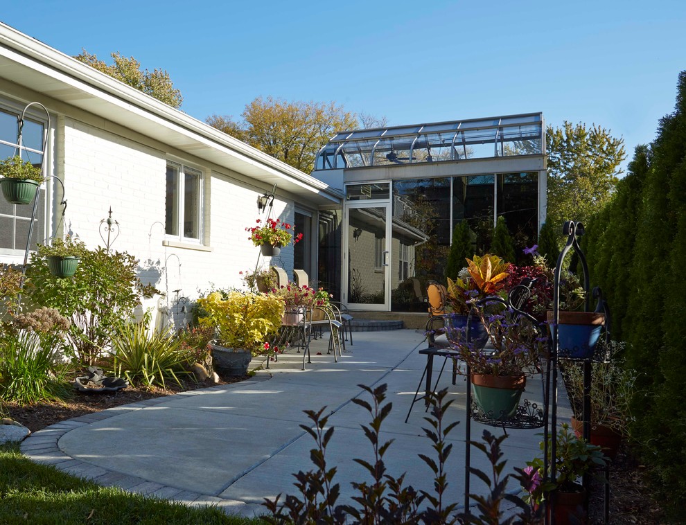 Indoor/Outdoor Greenhouse With Spa and Outdoor Living Environment Contemporary Patio