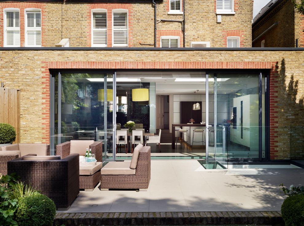 Design ideas for a contemporary back patio in Cheshire with no cover.