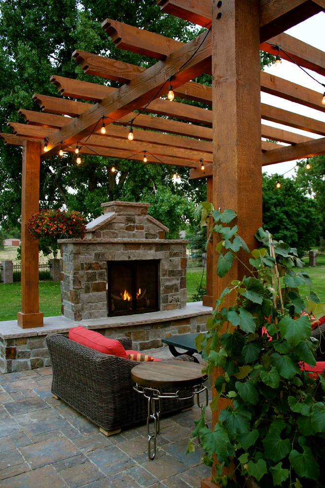 Inspiration for a timeless patio remodel in Denver with a gazebo