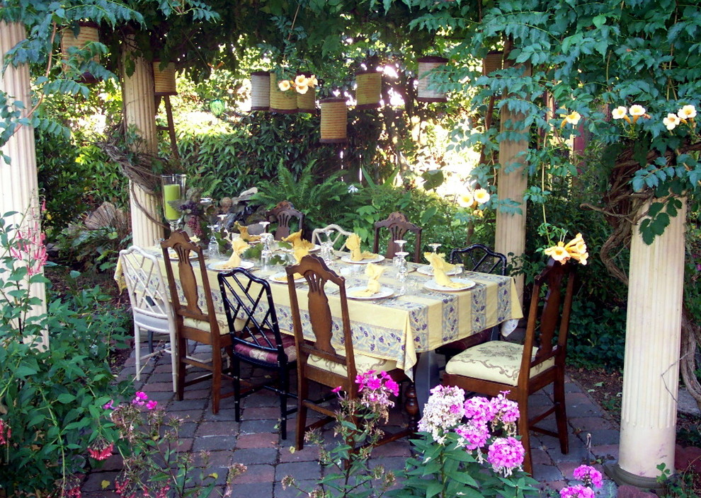 Patio - eclectic concrete paver patio idea in Portland