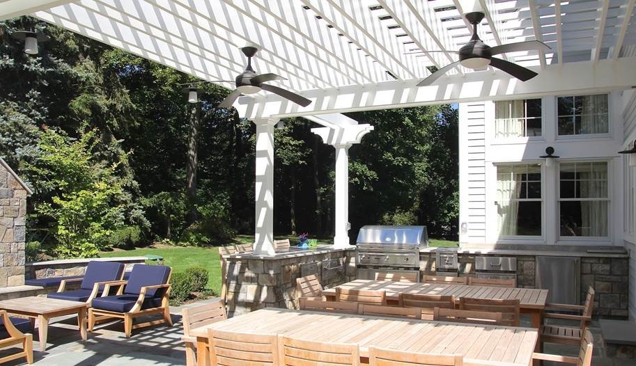 Patio - shabby-chic style backyard stone patio idea in New York