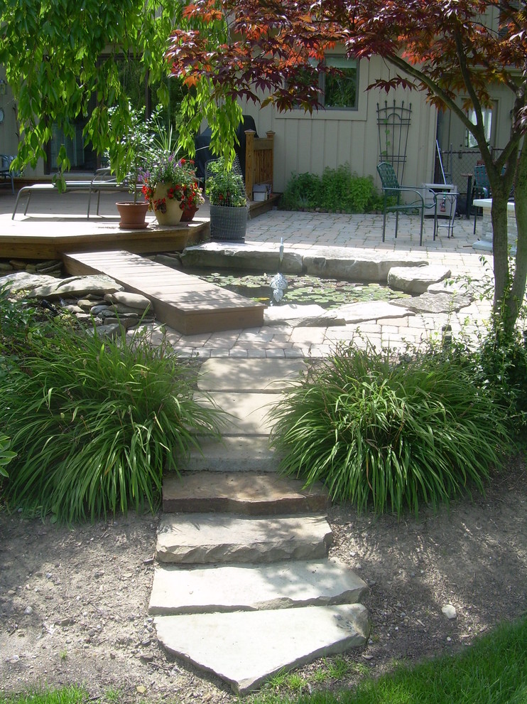 Example of an eclectic patio design in Cleveland
