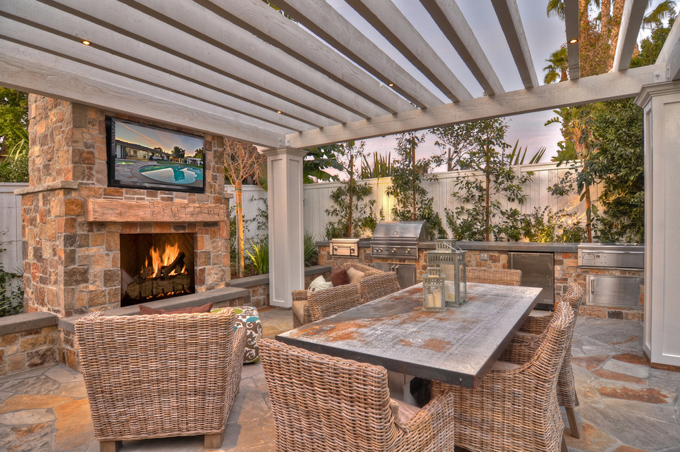 Patio - transitional patio idea in Orange County with a pergola and a bbq area