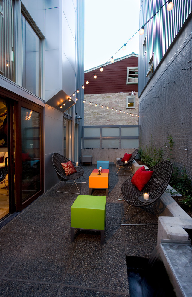 Patio - mid-sized industrial backyard patio idea in Salt Lake City with no cover