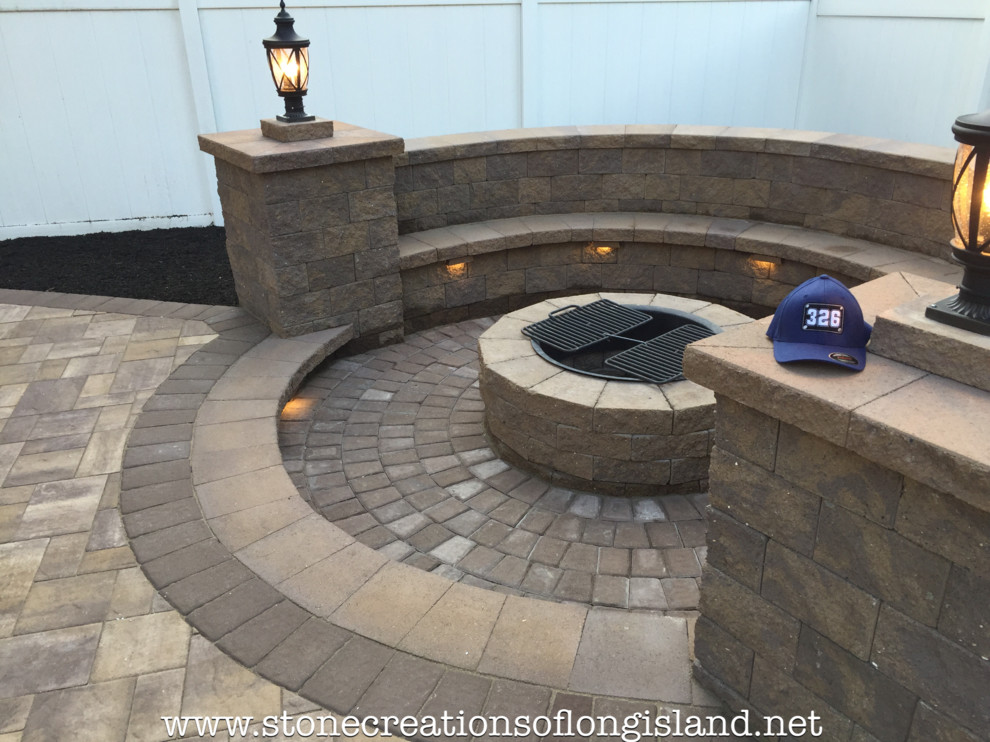 Patio kitchen - large contemporary backyard concrete paver patio kitchen idea in New York with no cover