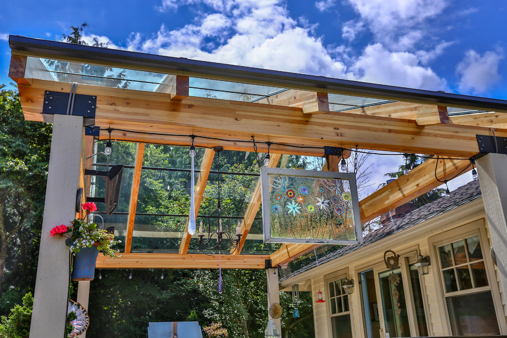 Idées déco pour une grande terrasse arrière moderne avec une cuisine d'été, du carrelage et une extension de toiture.
