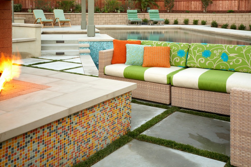 Design ideas for a contemporary patio in Los Angeles with a fire feature.