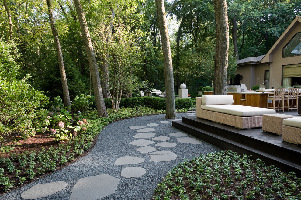 Inspiration for a large contemporary back patio in Chicago with an outdoor kitchen, tiled flooring and no cover.