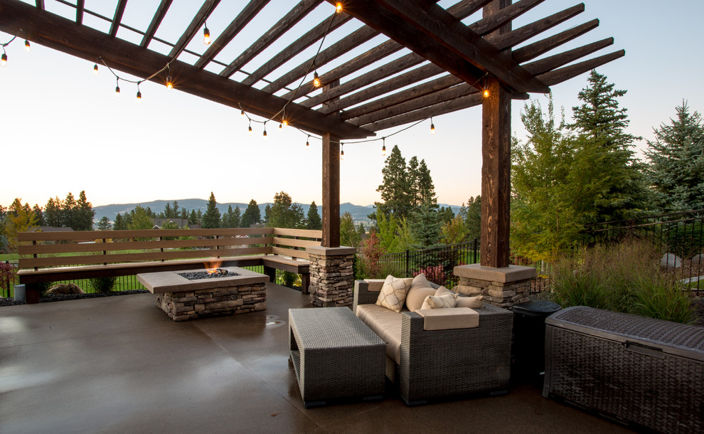 Contemporary patio in Seattle with a fire feature.