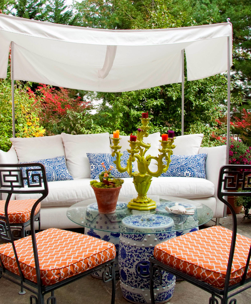 Large trendy side yard stone patio photo in Philadelphia with no cover