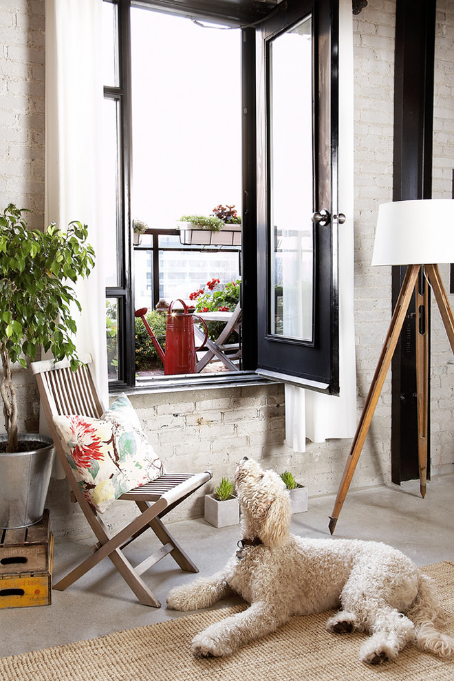 Aménagement d'une terrasse éclectique avec une dalle de béton.