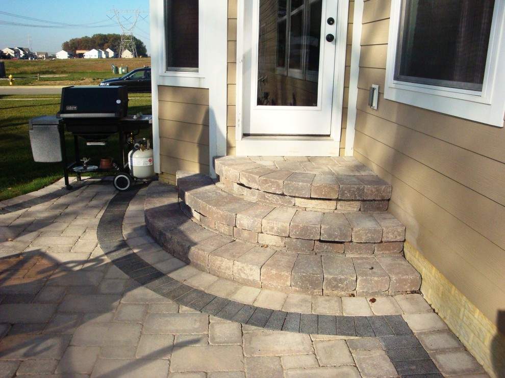 Lewis Center two tier patio and fire pit wall - Patio - Columbus - by