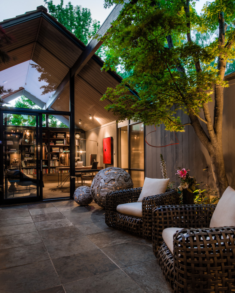 Inspiration for a contemporary patio in San Francisco with no cover and fencing.