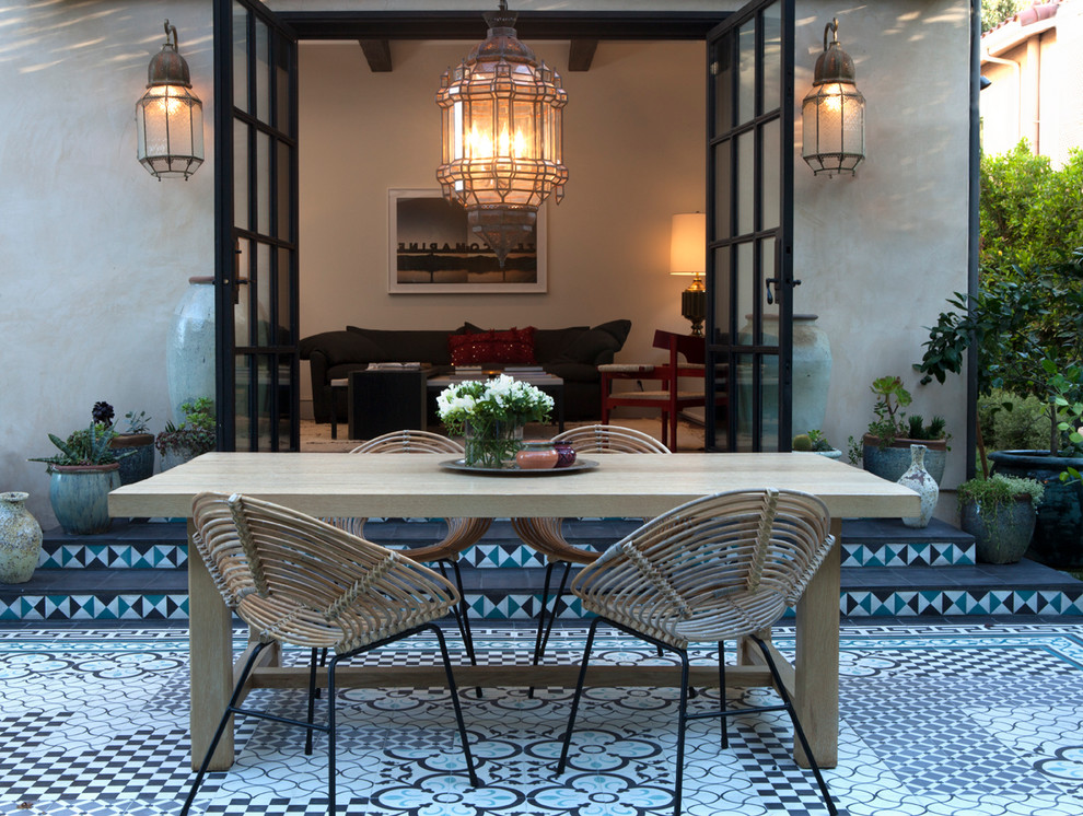Patio - mid-sized mediterranean backyard tile patio idea in Los Angeles with no cover