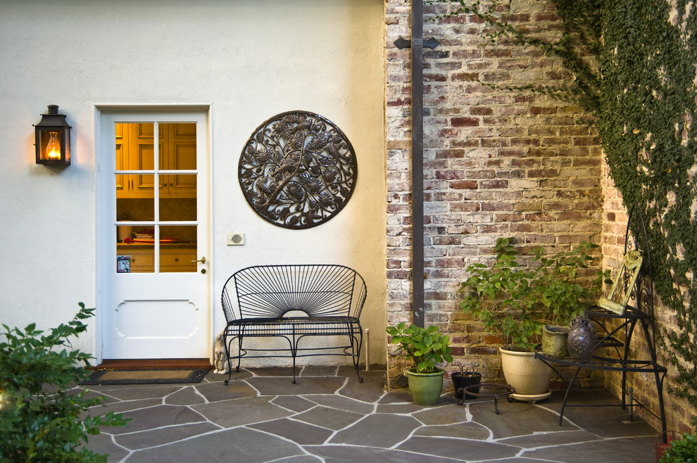 Patio - traditional stone patio idea in San Francisco with no cover