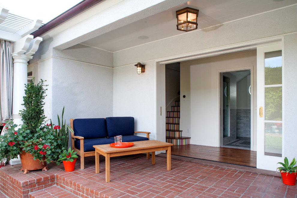Example of a classic brick patio design in Los Angeles
