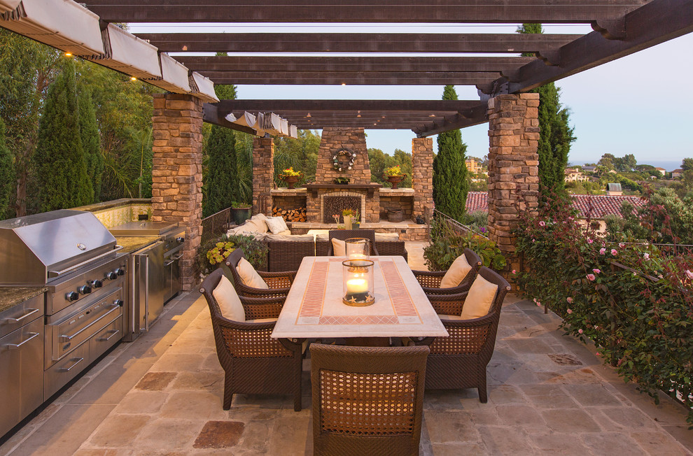 Inspiration for a mediterranean patio remodel in Los Angeles with a gazebo