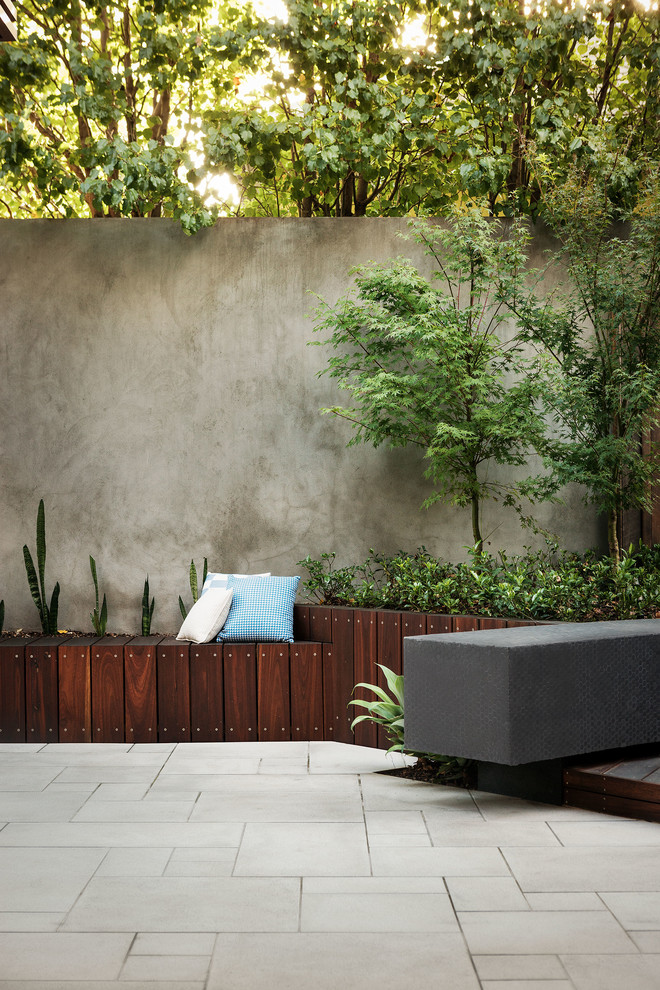 Design ideas for a contemporary courtyard patio steps in Melbourne.