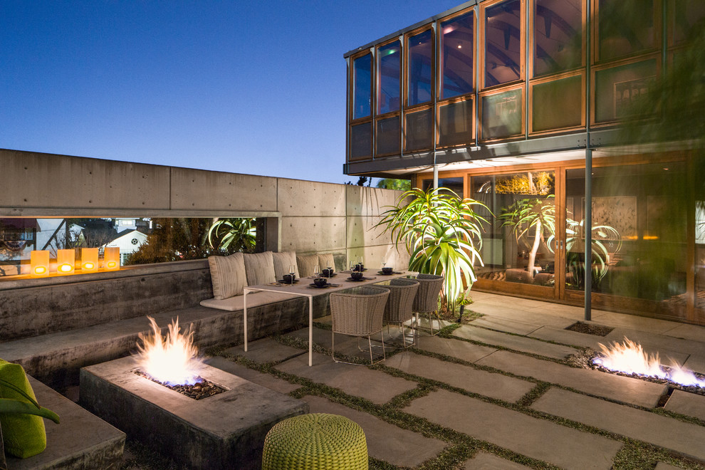 Trendy concrete paver patio photo in Los Angeles