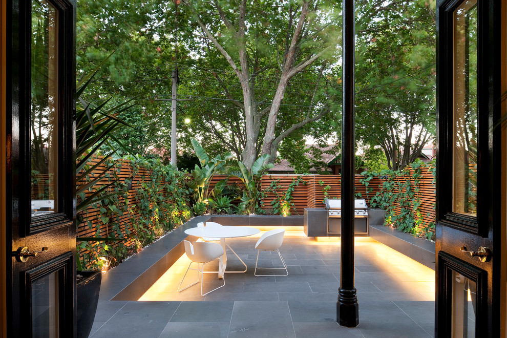 Photo of a contemporary back patio in Melbourne.