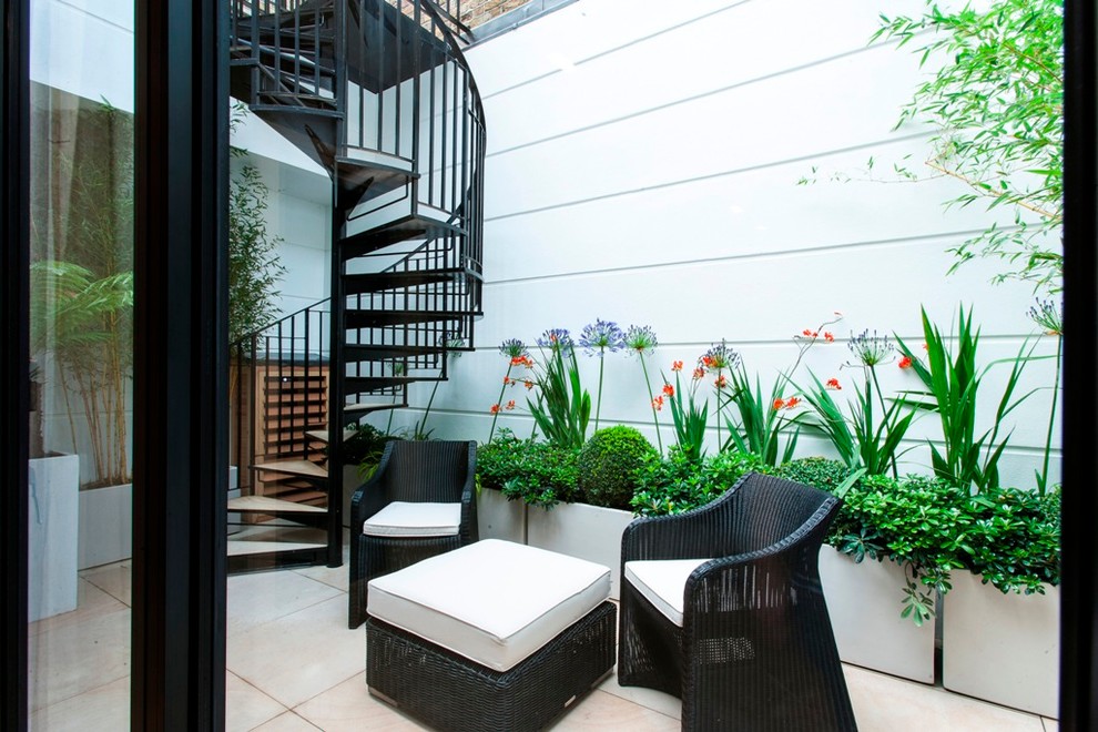 Patio - contemporary patio idea in London
