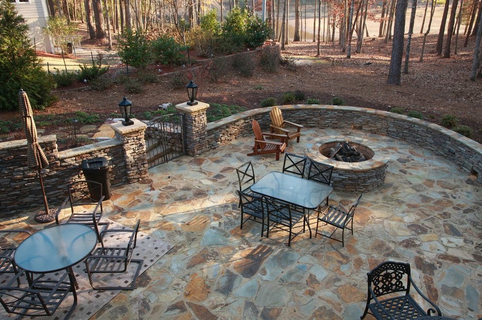 Photo of a large contemporary back patio in Atlanta with a fire feature.