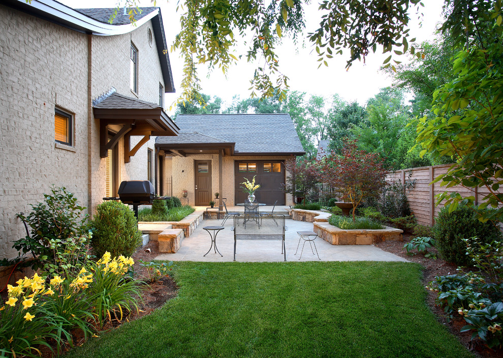 Traditional back patio in Atlanta with a bbq area.
