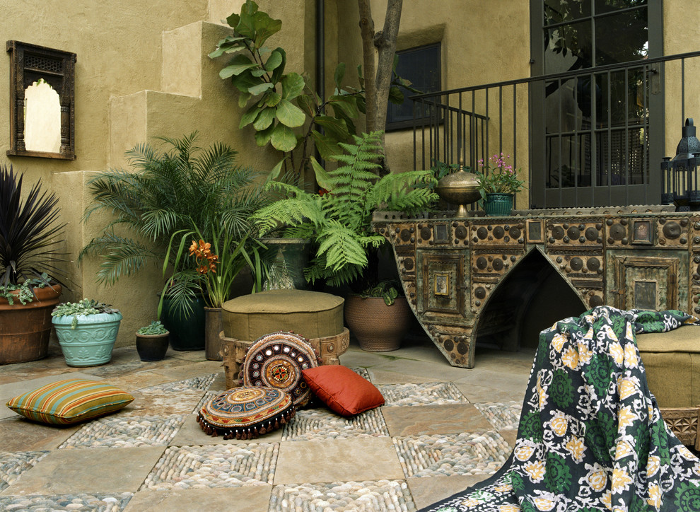 Example of a tuscan patio design in Los Angeles