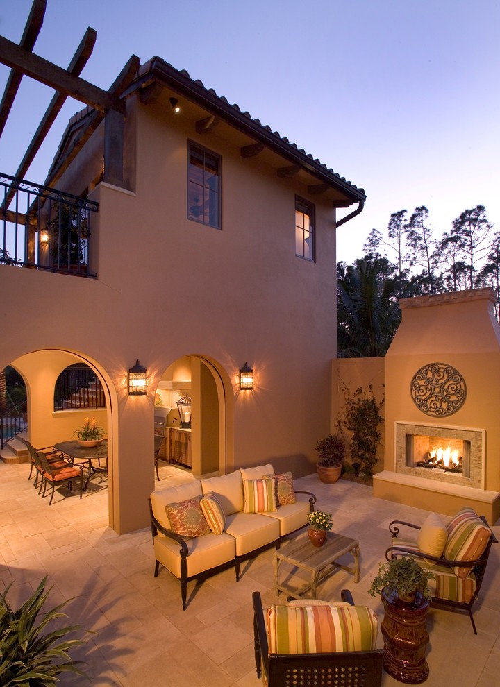 Photo of a mediterranean courtyard patio in Other with a pergola and a bbq area.