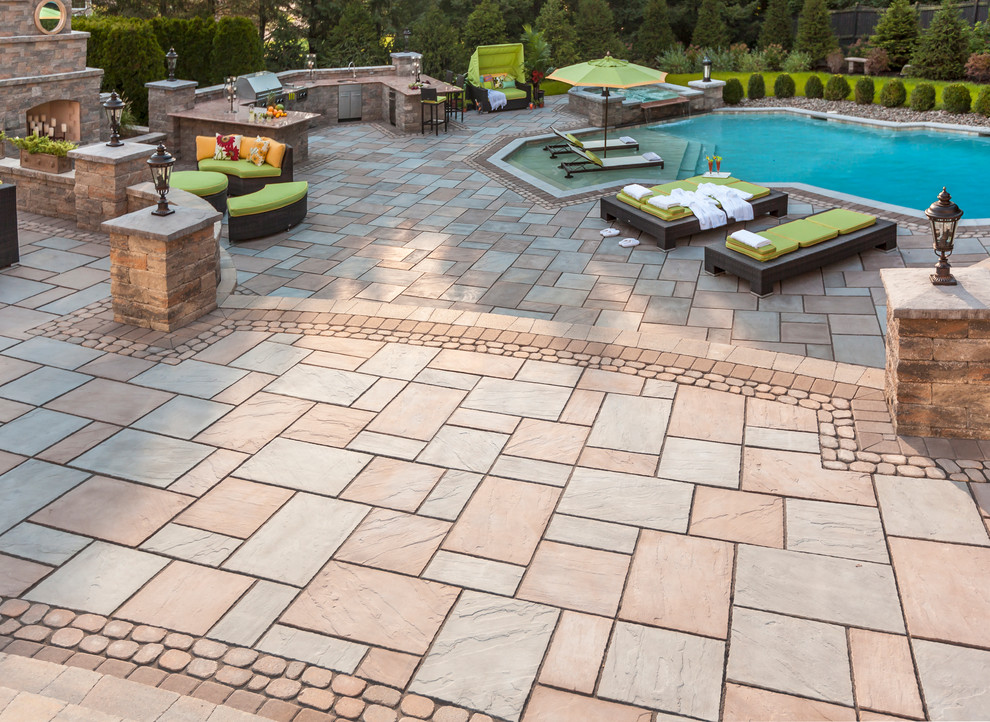 Example of a mid-sized tuscan patio design in Other