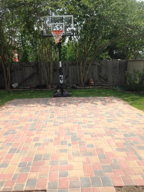 Medium Pavestone Patio used as a Basketball Court Traditional Patio