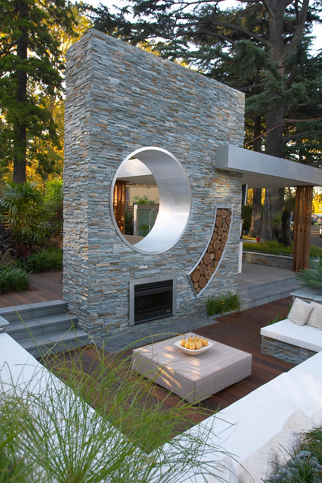 Inspiration for a contemporary patio in Melbourne with a fire feature.