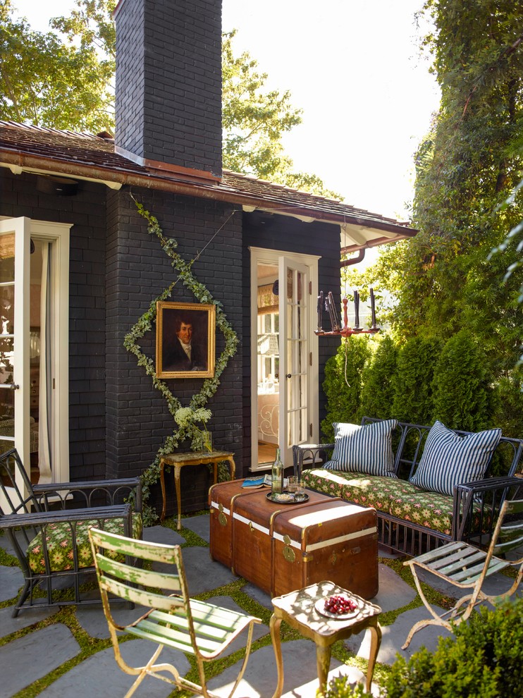 Inspiration for a small victorian backyard concrete paver patio remodel in San Francisco with no cover