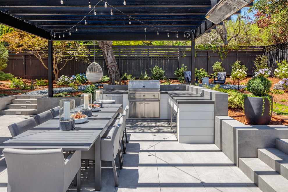 Design ideas for a traditional back patio in San Francisco with a pergola and a bbq area.