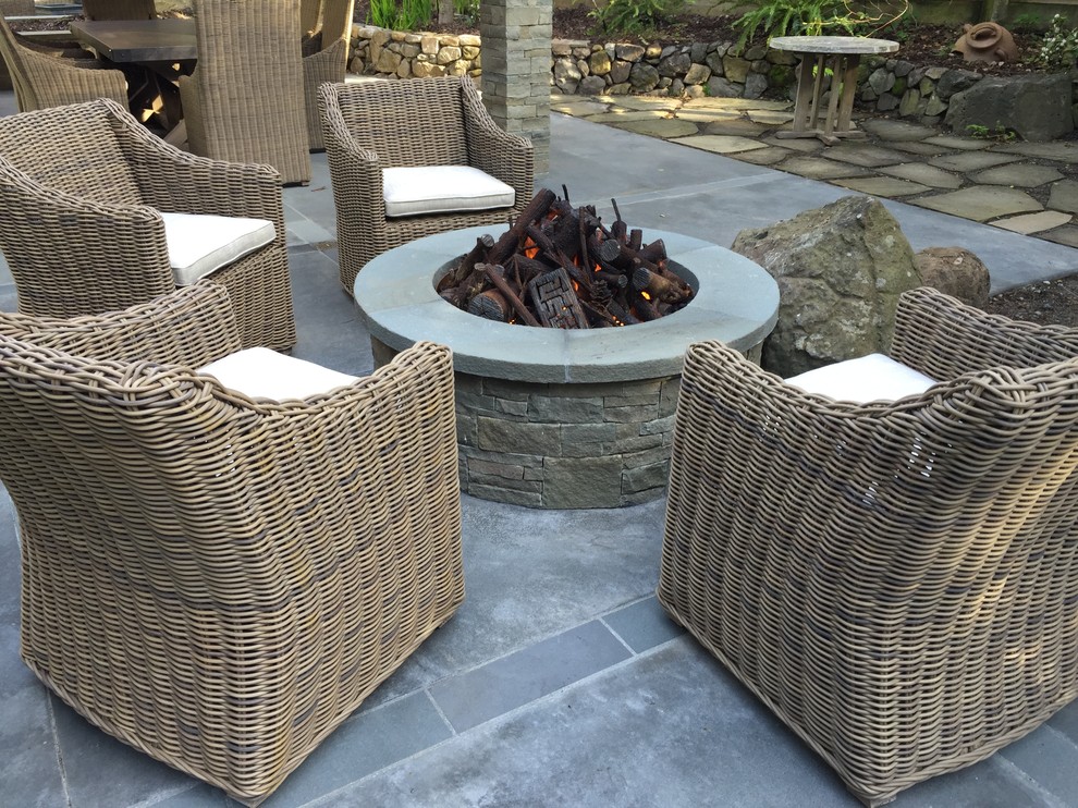 Large transitional backyard concrete paver patio photo in San Francisco with a fire pit and a pergola