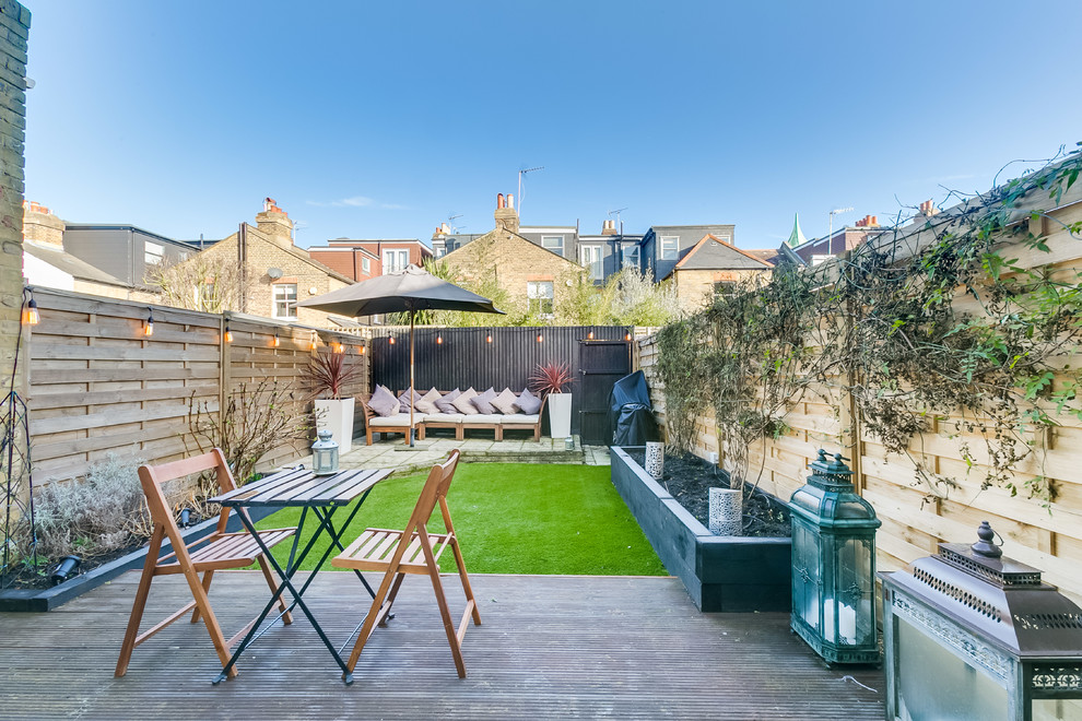 Idee per un patio o portico design di medie dimensioni e dietro casa con nessuna copertura