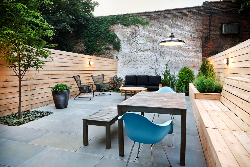 Photo of a contemporary patio in New York with no cover.
