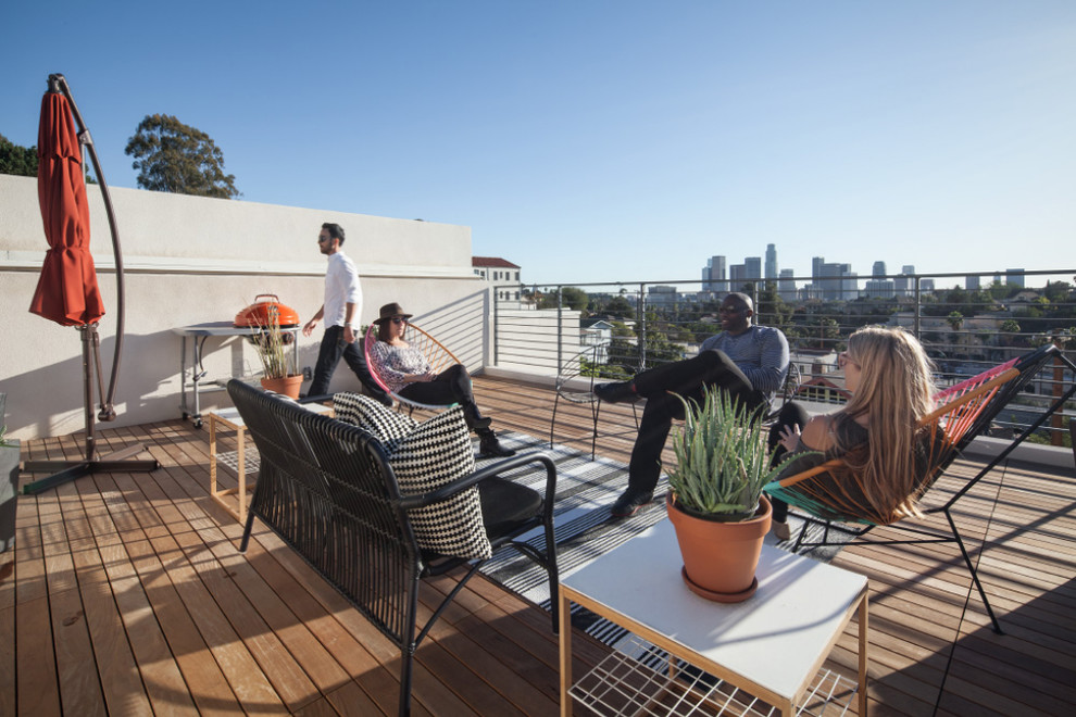 Modern Patio with Acapulco Chair and Awning Stripe Rug Modern Patio