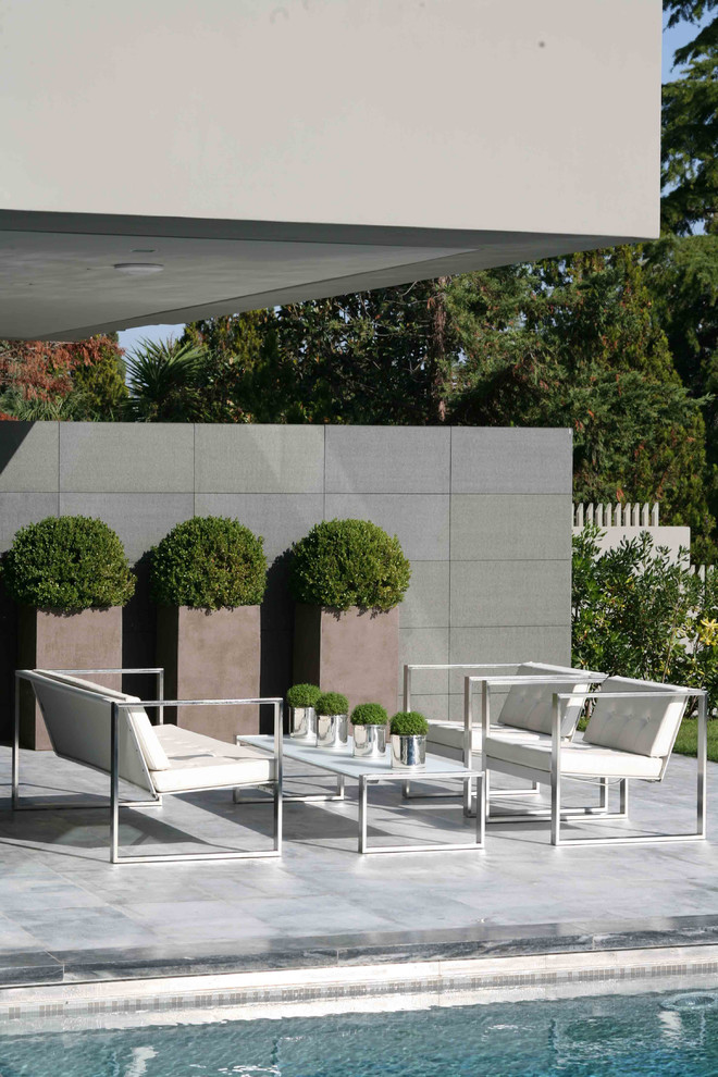 Patio - modern patio idea in Other