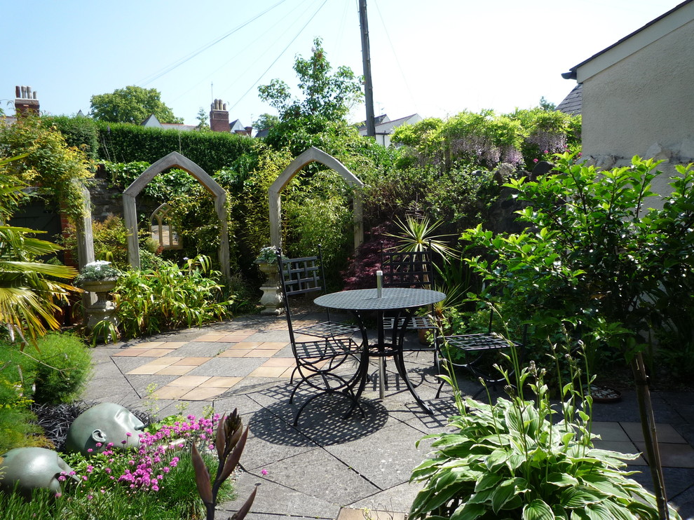 This is an example of an eclectic patio in Cardiff.