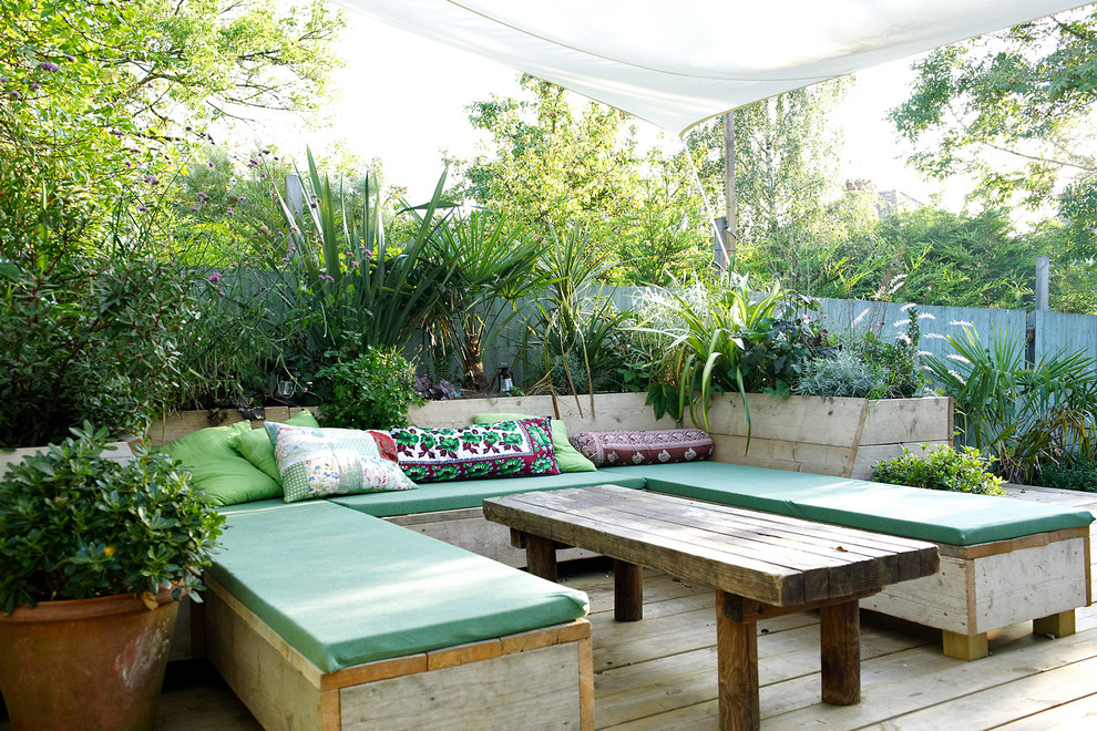 Inspiration for a shabby-chic style patio remodel in London
