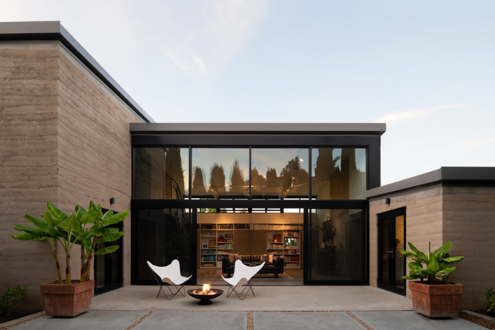 Patio - contemporary patio idea in San Francisco with a fire pit and no cover