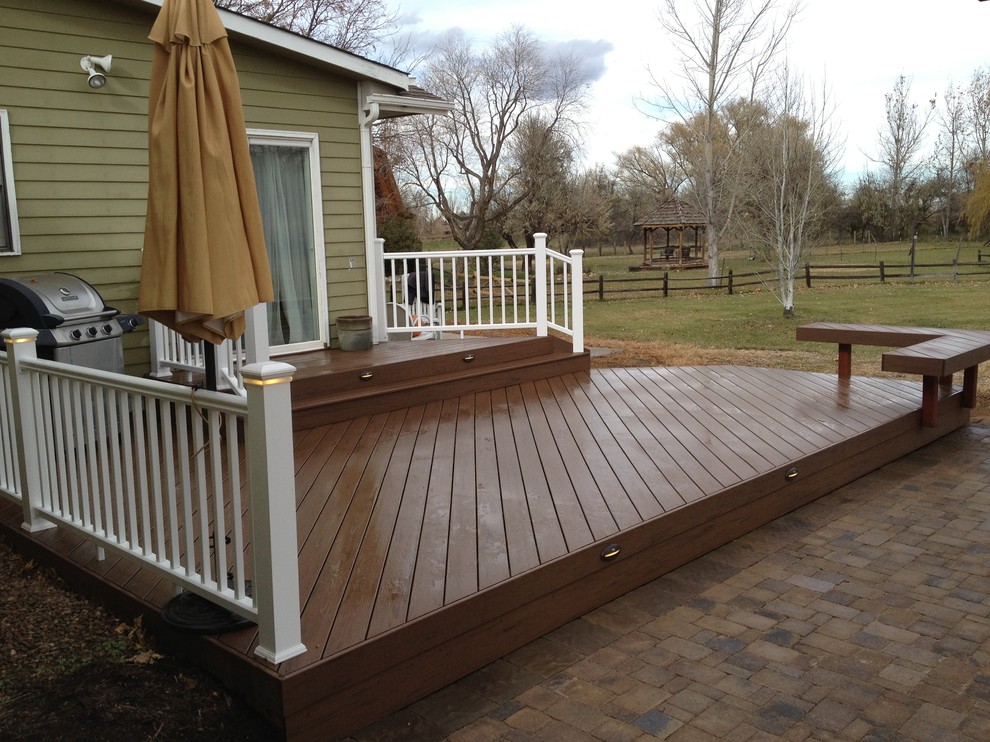 Example of a country patio design in Denver