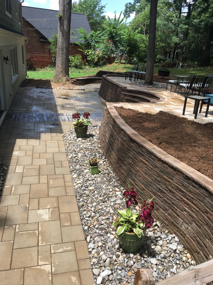 MultiLevel Paver Patio with Staircase and Seating Traditional