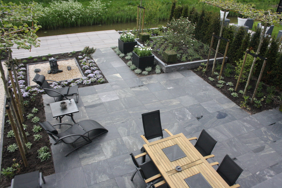 This is an example of a contemporary patio in Amsterdam.